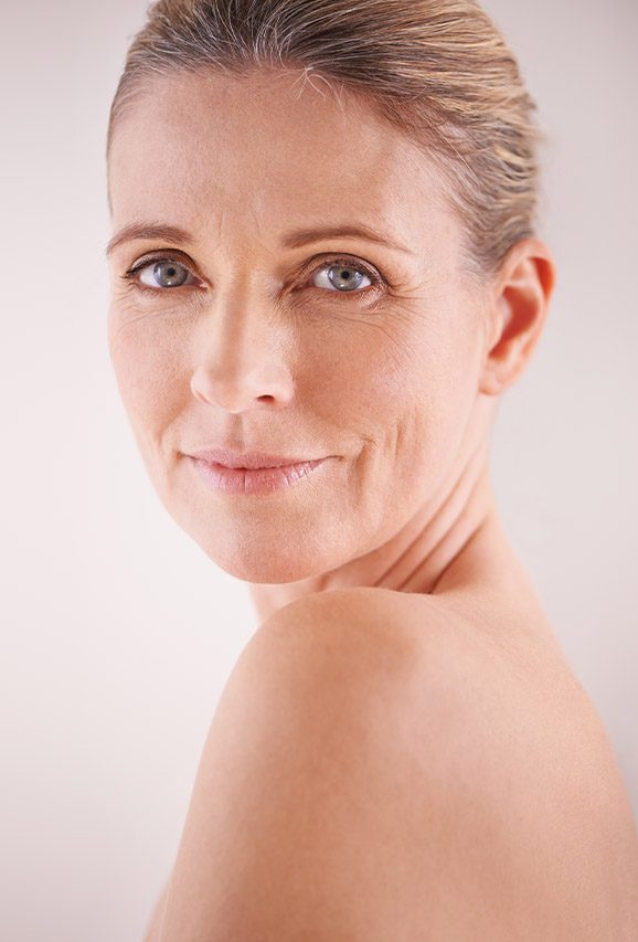 Photo of an older woman with aging skin