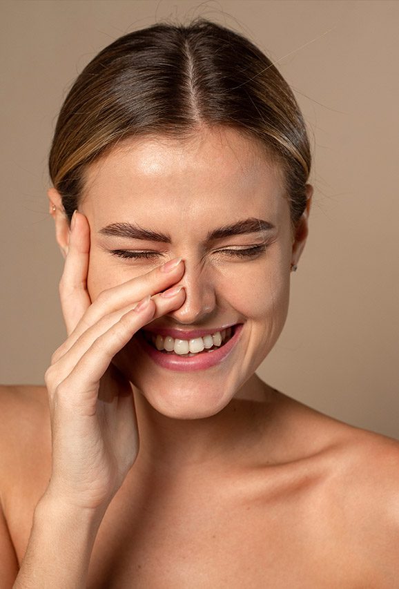 Photo of a smiling, happy woman with great skin Client results after hydro facial in Queen Creek, Arizona