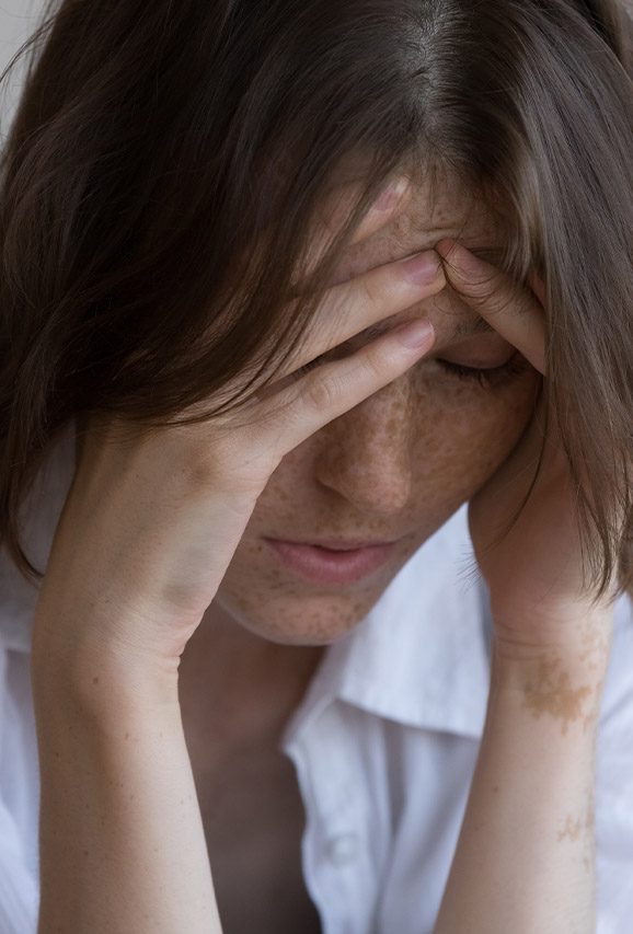 Photo of a woman dealing with dehydration