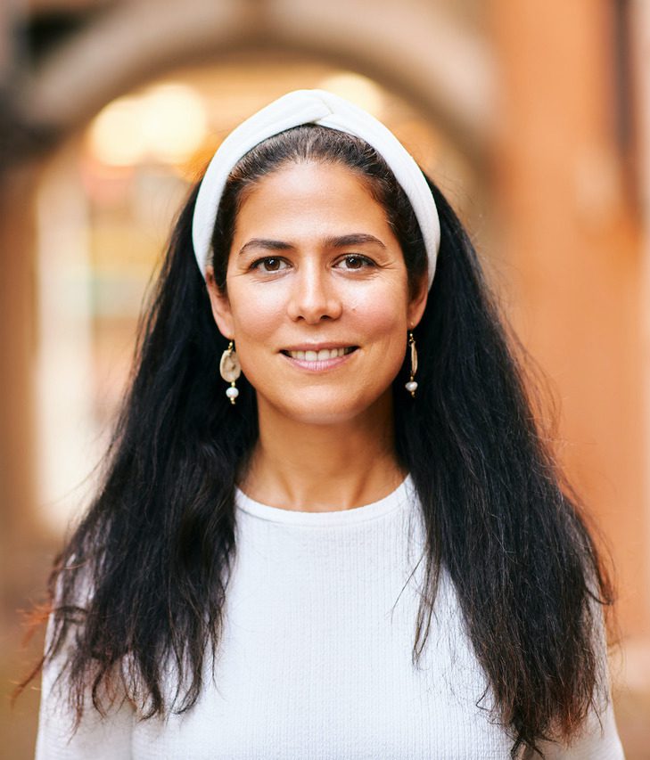Photo of a happy, healthy middle-age woman after MonaLisa Touch® treatments